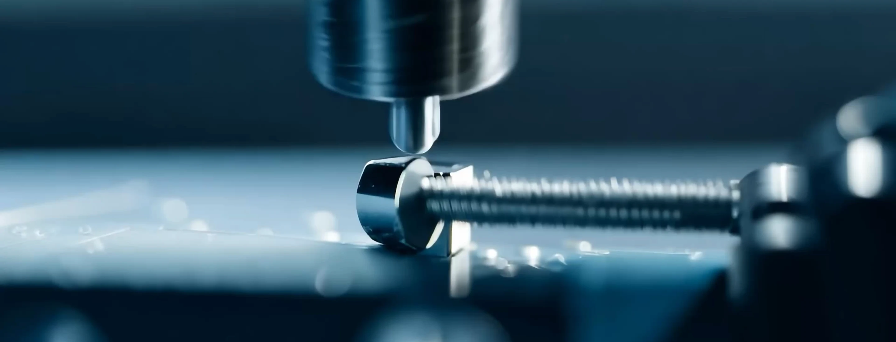 Close-up of precision machining on a bolt head